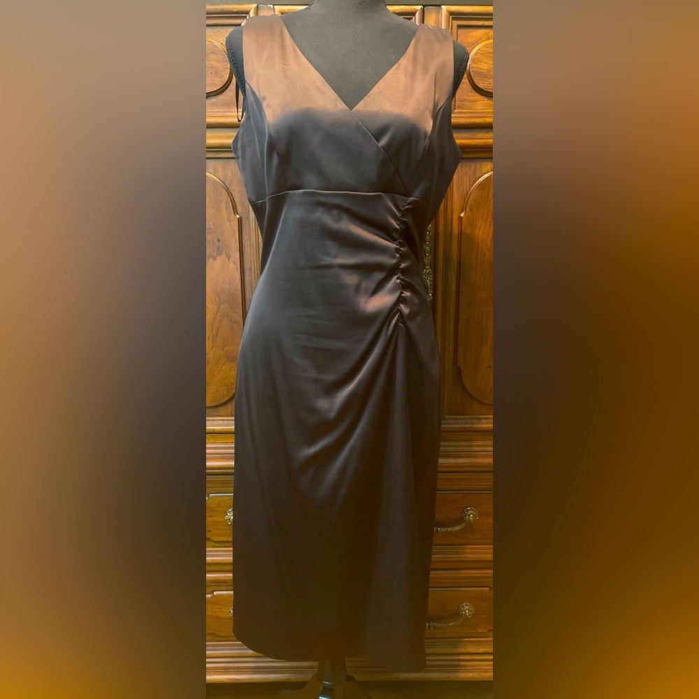 Rich brown satin dress. V-neck in front and back. Zipper closure in back.